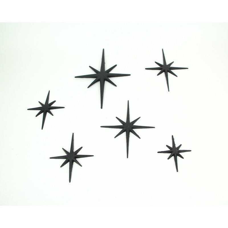 Mid-Century Modern black enamel cast iron 8-point starburst wall sculptures — set of 6, 4.25-8.75" L x 0.25" W x 4.75-12" H