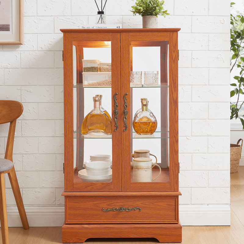 Lighted Glass Curio Cabinet With Adjustable Shelves, Vintage Handles, Anti - Tip Device, Drawer And Mirrored Back For Displaying Treasured Items