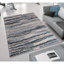 Tapis tissé à rayures bleues