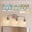 Luminaire de meuble-lavabo moderne avec abat-jour en verre transparent-471192553-321541586