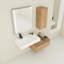 Armoire de salle de bain moderne avec lavabo en résine et tablette latérale