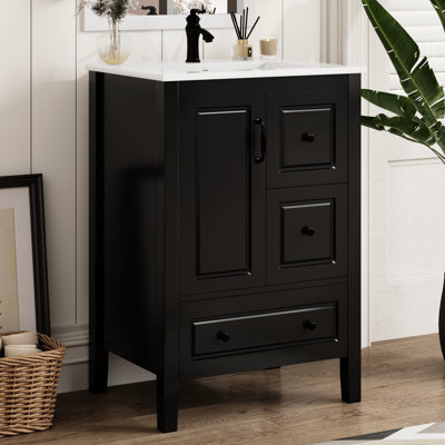 Meuble-lavabo autoportant noir de 24 pouces avec lavabo en céramique lisse, une porte à fermeture douce et 3 tiroirs pour l'armoire de rangement pour salle de bain