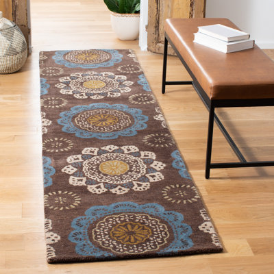 Kouerga Hand Tufted Wool/Cotton Floral Rug in Beige/Brown/Blue
