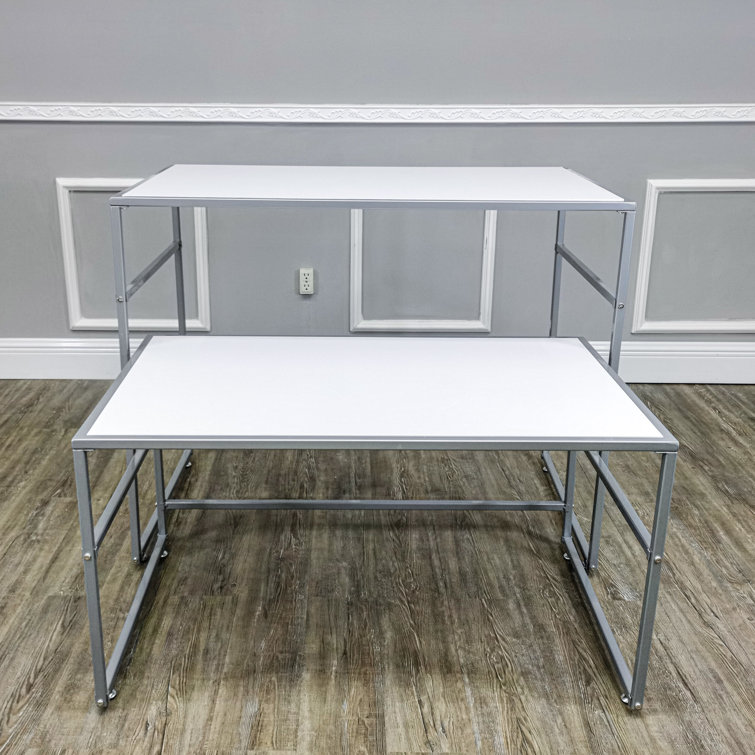 Set of 2 Nesting Display Tables 41.46" W x 24.02" D x 32.76" H and 38.7" W x 20.16" D x 23.23" H