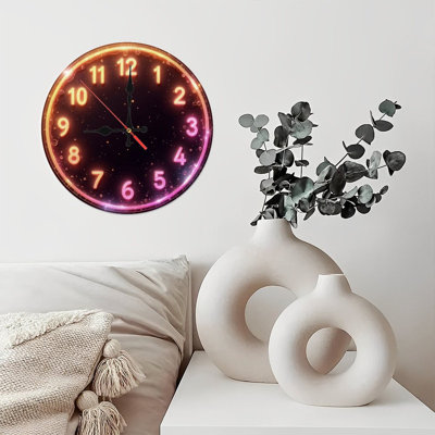 Horloge lumineuse avec chiffres et étoiles