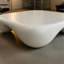 Table basse moderne en faux travertin texturé pour le salon / bureau-901062324