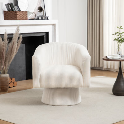 Fauteuil demi-tonneau pivotant en velours Chynna
