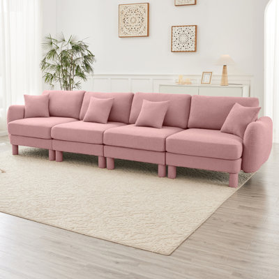 Canapé rose à 4 places en tissu bouclé avec construction et configuration de siège souple pour une utilisation régulière