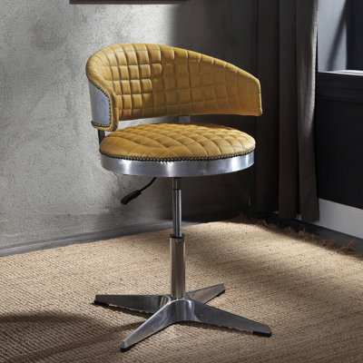 Tabouret pivotant et réglable en curcuma et en chrome