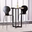 Table bistro avec plateau en chêne brûlé et base en métal noir pour petits espaces et utilisation multifonctionnelle