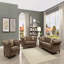 Fauteuil d'appoint brun capitonné avec coussin