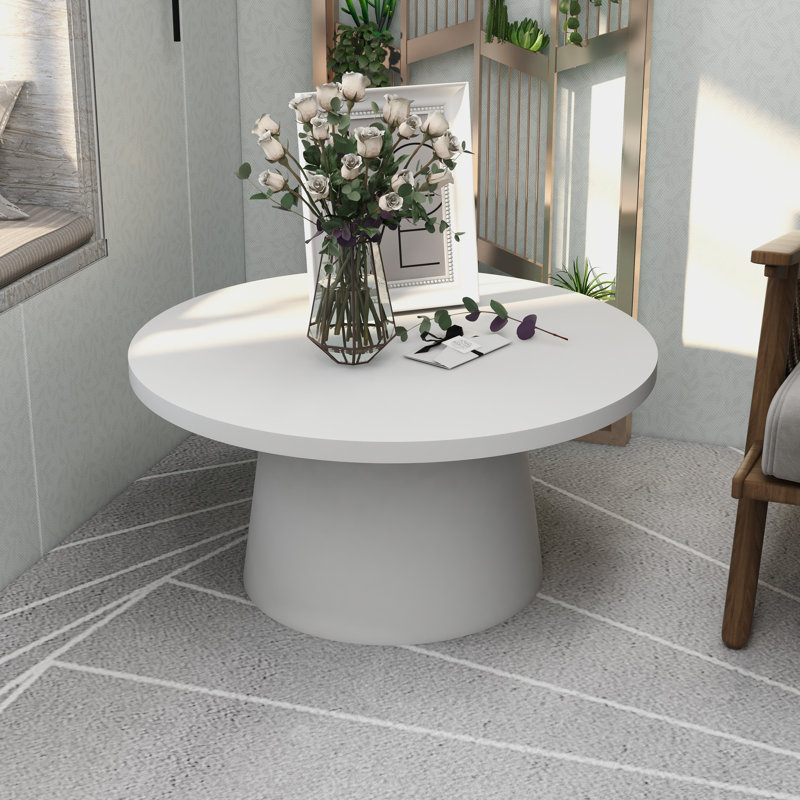 Table basse ronde en fibre de pierre avec piédestal Ladislava, Blanc