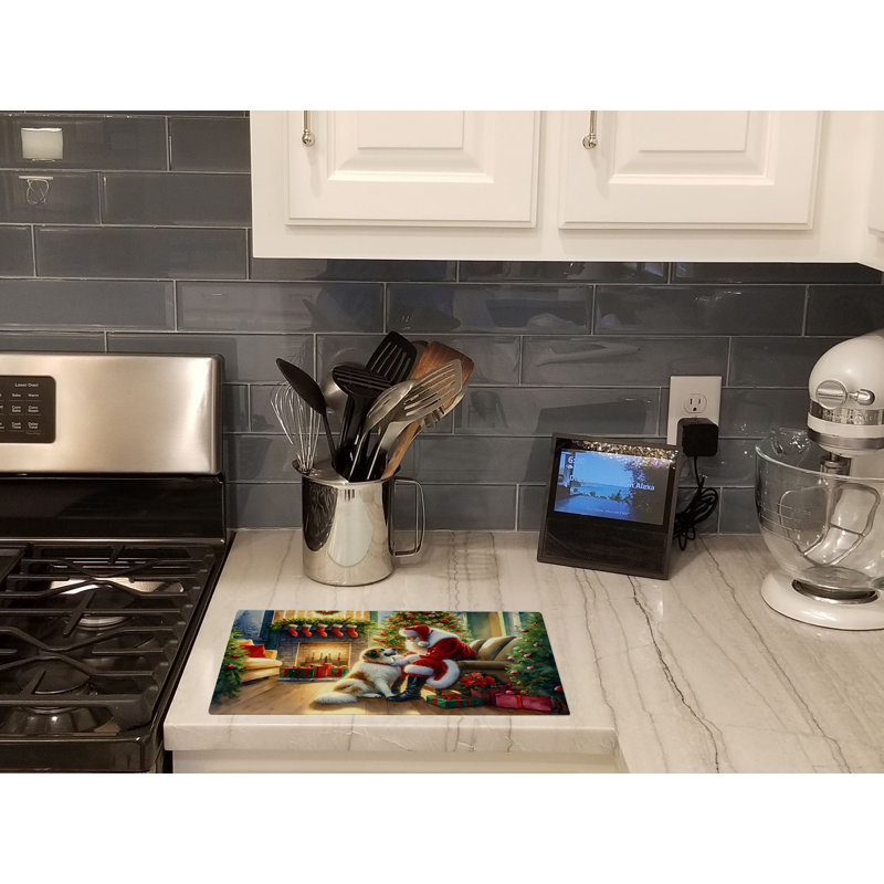 Great Pyrenees and Santa Claus Glass Cutting Board