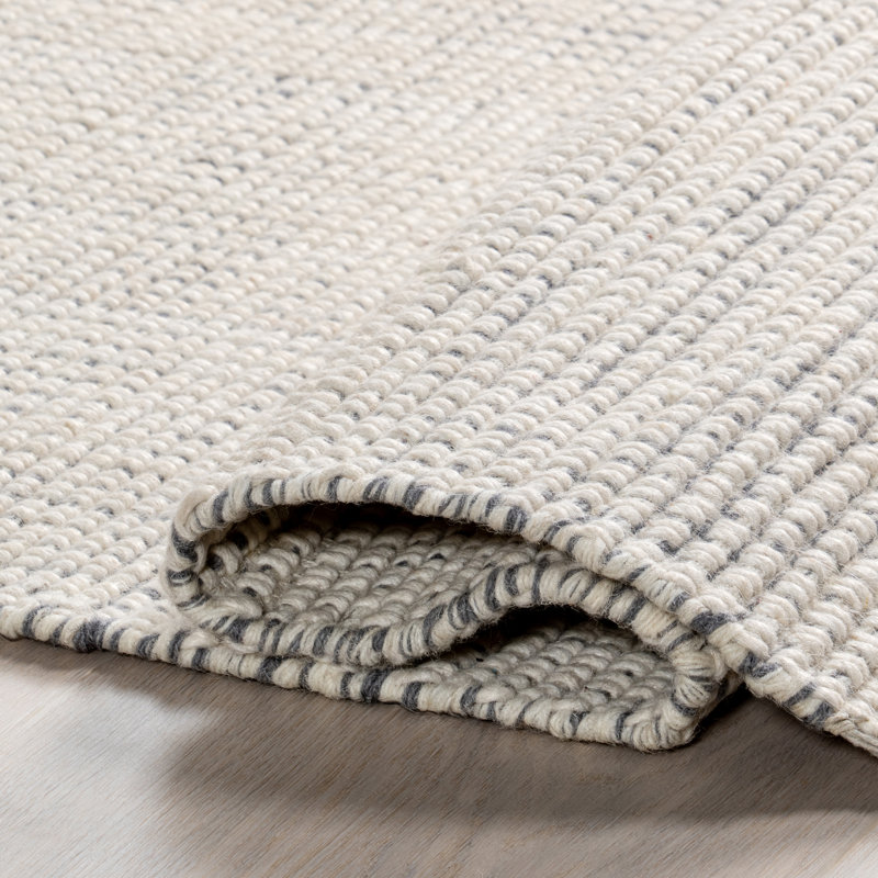 Handmade Ivory Wool Rectangular Area Rug with Fringe