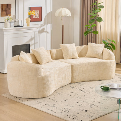 Canapé beige courbé et compressé, conception créative de style nordique pour le salon, confortable, doux et adapté à de multiples cas de figure