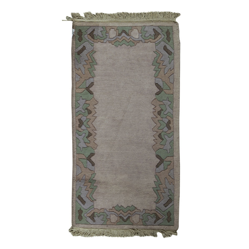 Tapis rouge et ivoire noué à la main de haute qualité