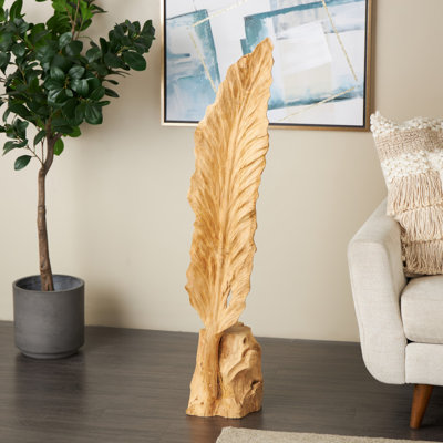 Sculpture en bois de teck brun