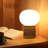 Neptune 12" LED Table Lamp With Natural Travertine Stone Base