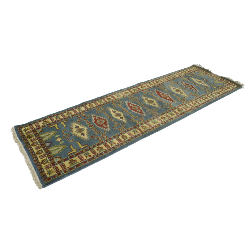 Tapis bleu géométrique en laine noué à la main