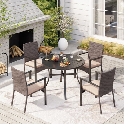 Leonard 4 - Person Patio Dining Set with Round Table , Cushions Included