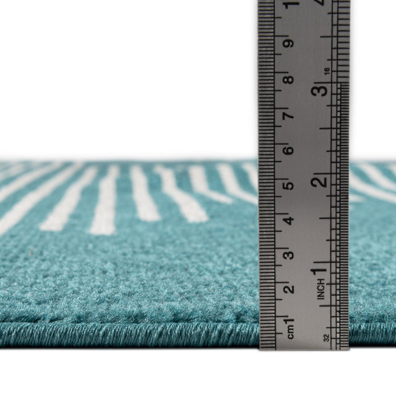 Tapis géométrique tissé à la machine en polypropylène turquoise, Carré 9 pi 10 po