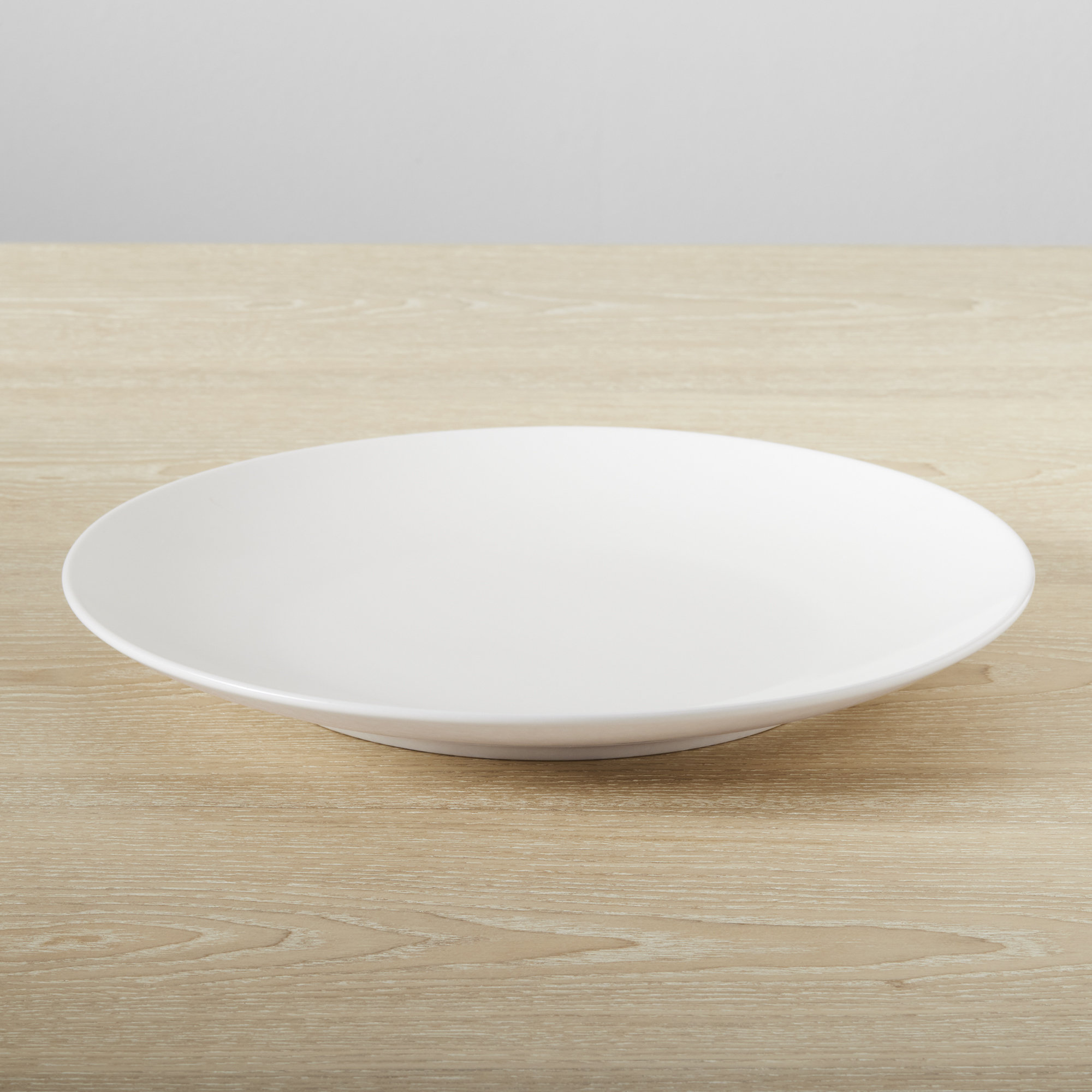 Izie Coupe Stoneware Dinner Plate, White