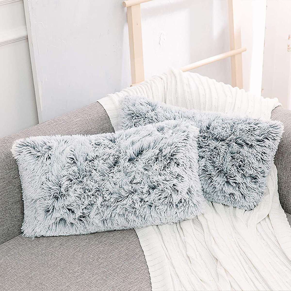 https://assets.wfcdn.com/im/01707811/compr-r85/2477/247780755/lysandre-faux-fur-pillow-cover.jpg