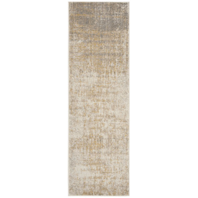 Tapis crème / doré Bethlyn
