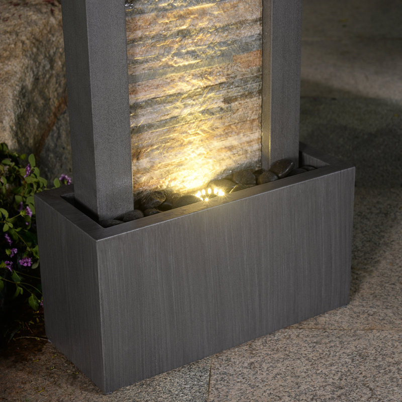 Fontaine en métal zen polyvalente avec détails de brique en pierre , Gris