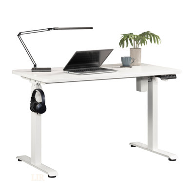Bureau réglable assis / debout avec finition blanche, surface spacieuse et réglages de mémoire ergonomiques pour un confort et une productivité accrus.