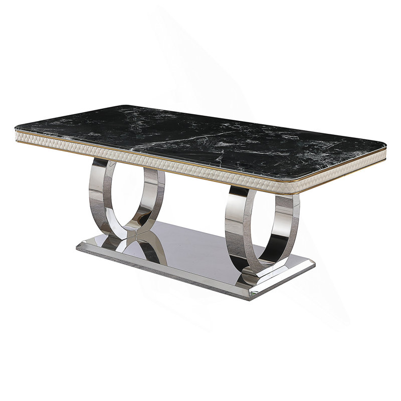Table de salle à manger de luxe moderne avec plateau en faux marbre et base à double cercle, idéale pour rehausser les expériences culinaires et ajouter de la sophistication à tout espace.