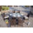 Omied 6 - Person Wicker Patio Dining Set with Oval Table , Cushions Included