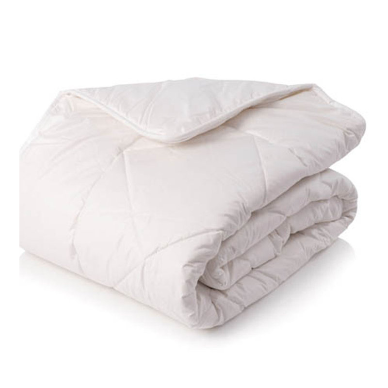 Très grand confort pour une solution en duvet synthétique toutes saisons, Simple