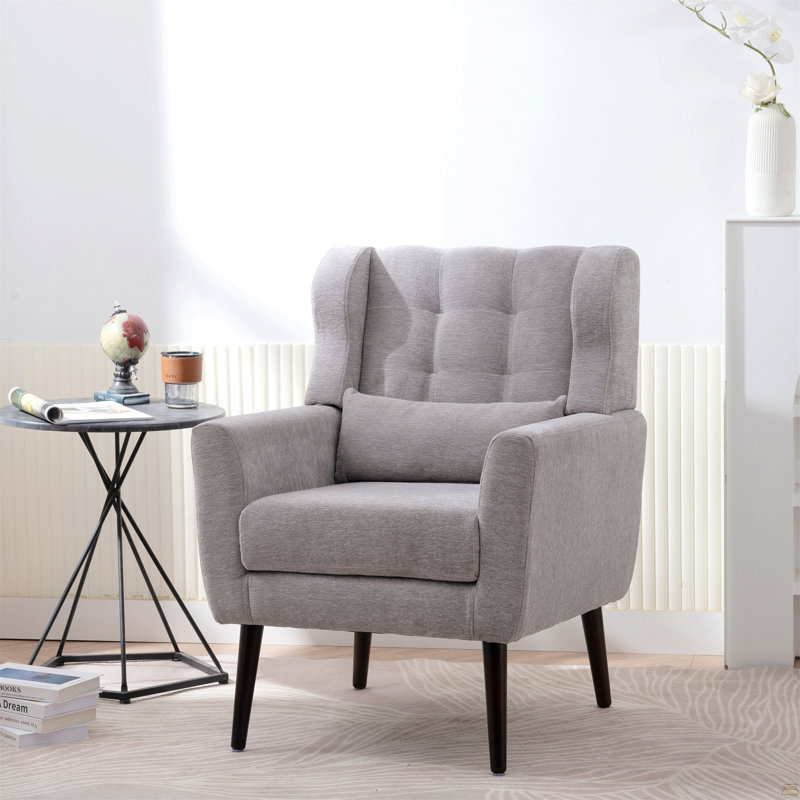 Fauteuil ergonomique en chenille de couleur grise avec pieds en bois massif pour un espace de vie confortable et confortable