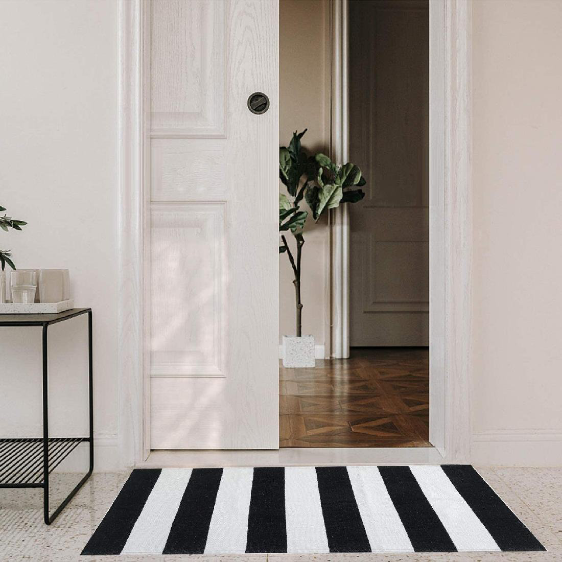 https://assets.wfcdn.com/im/01739657/compr-r85/2196/219644102/alisah-striped-outdoor-doormat.jpg