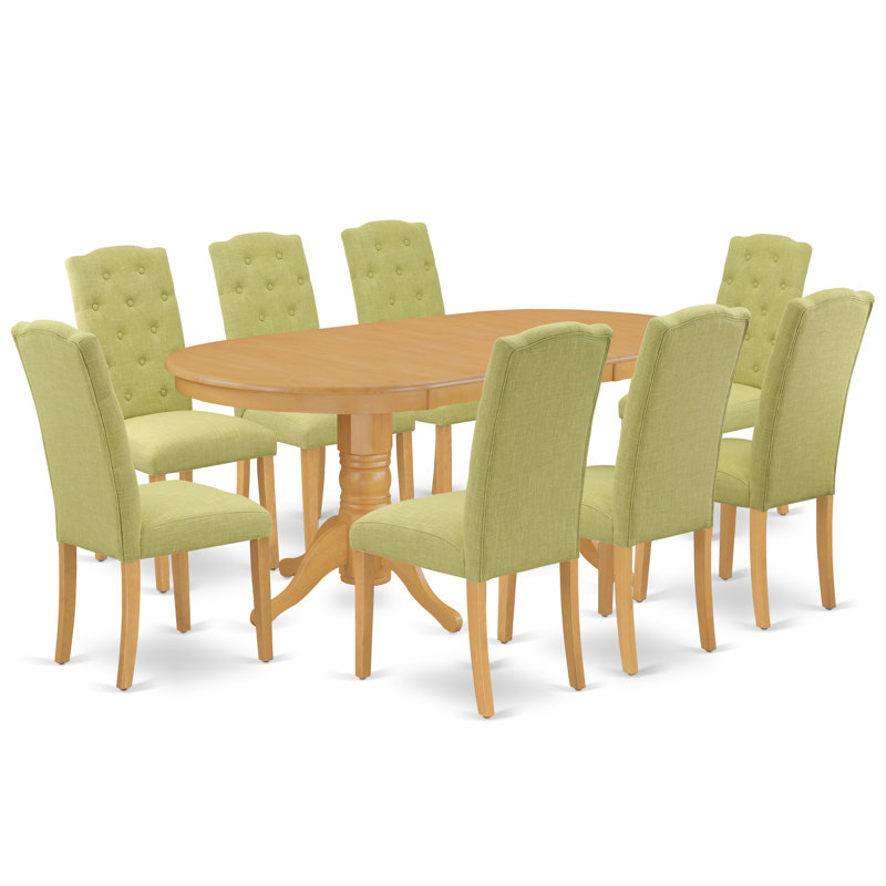L'ensemble de mobilier de salle à manger 9 pièces comprend une table ovale en bois avec feuille papillon et 8 chaises parsons Limelight en tissu de lin, chêne