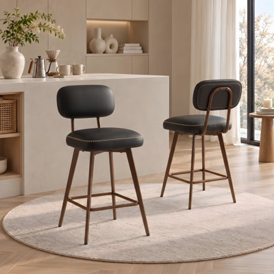 Tabourets de bar Nidovia 63,5 cm (25 po) de hauteur comptoir, pivotants à 360°, dossier bas, revêtement en similicuir, assise rembourrée, pieds en métal et repose-pieds.