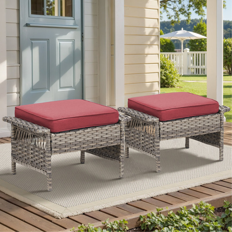 Ensemble de 2 repose-pieds d'extérieur en rotin gris avec coussins rouges pour cour ou terrasse
