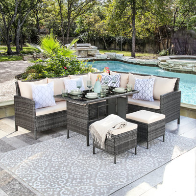 Everill Rattan Wicker 9 - Person Seating Group with Cushions