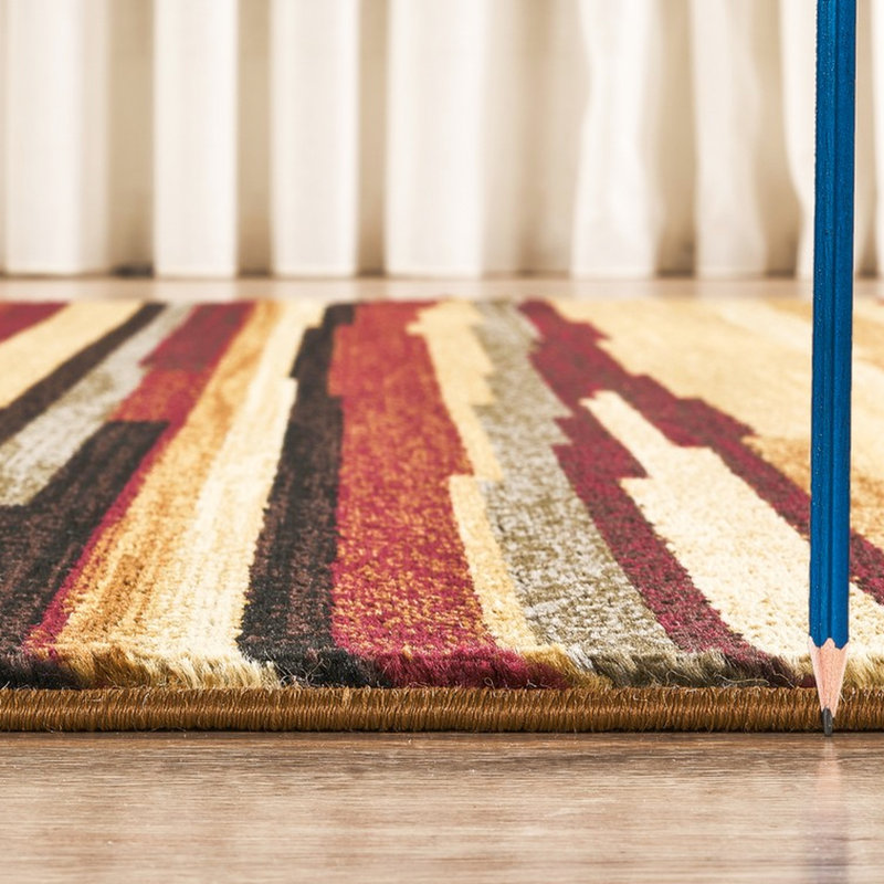 7 pi 10 po Le tapis multicolore en polypropylène By 3 de By By 3 ajoute une touche sophistiquée