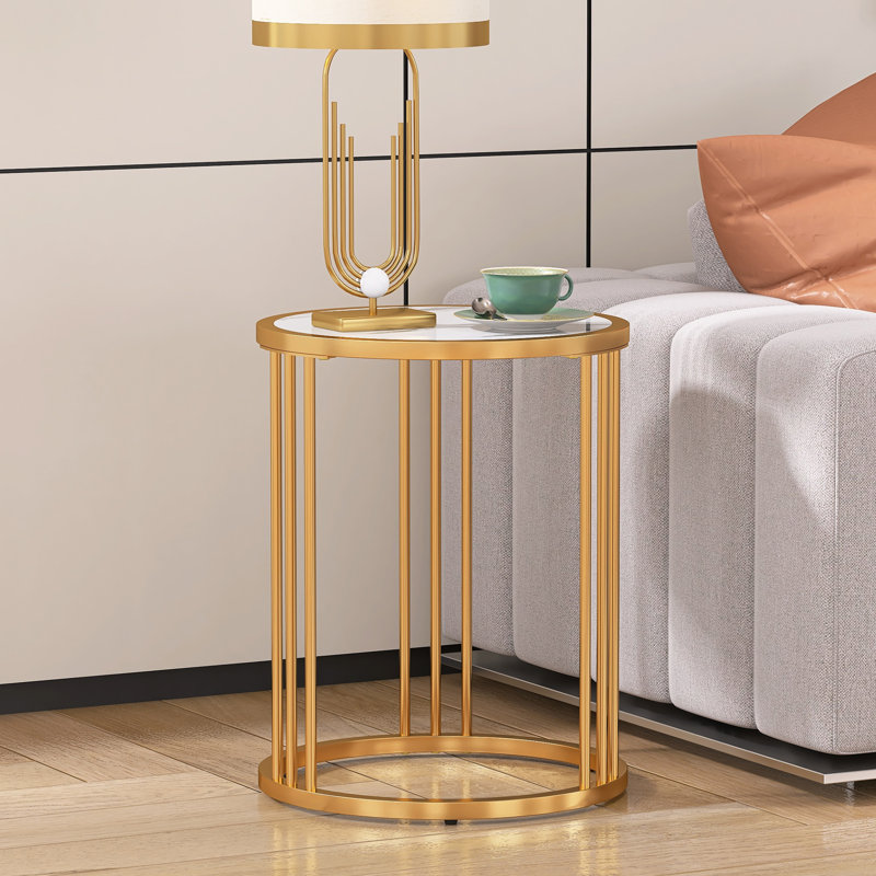 Table d'appoint ronde en pierre frittée avec structure en acier inoxydable doré