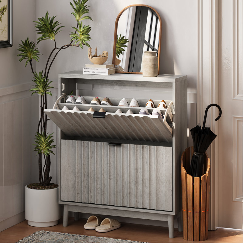 Rangement pour chaussures avec 2 compartiments et portes ondulées, couleur grise, élégant pour le vestibule, rangement pratique, talons cannelés de construction, décor contemporain, espace généreux, fabrication de haute qualité