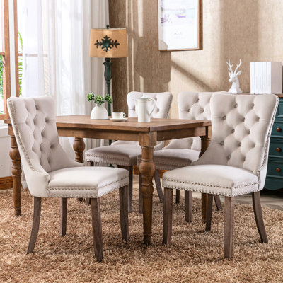 Chaise de salle à manger rembourrée en velours de bois massif haut de gamme American Design, 2 pièces beige, assise confortable avec chaises en bois d'hévéa modernes à ressorts en acier, garniture cloutée et pieds réglables