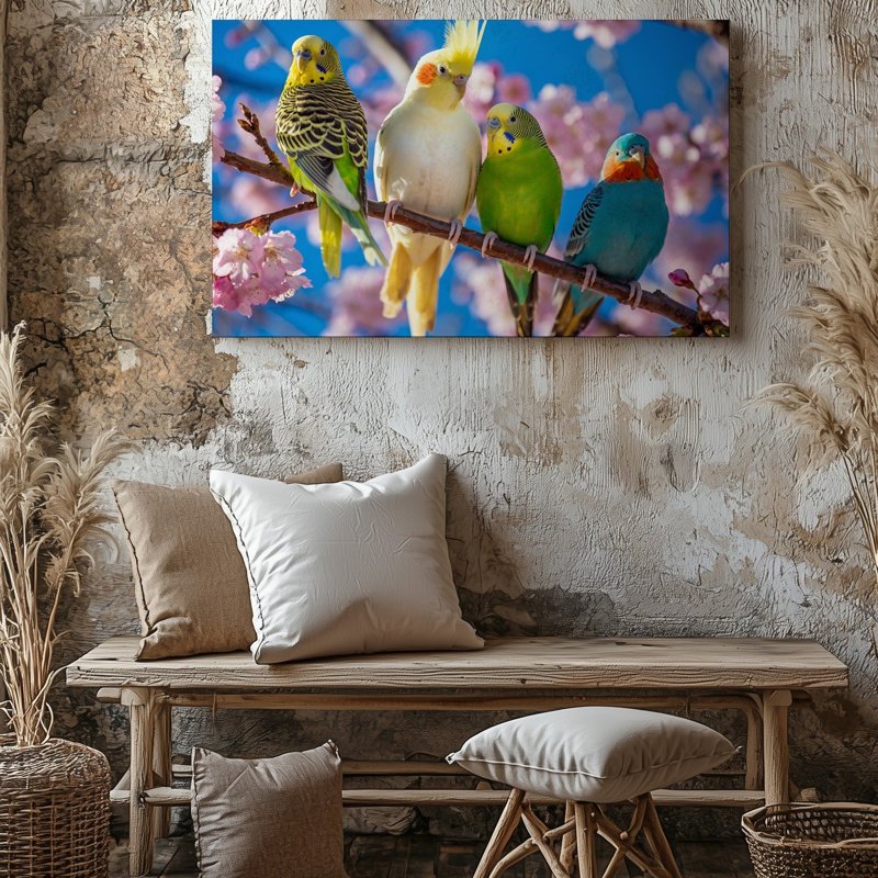 Toile dans un cadre extérieur serein, perchoir à quatre oiseaux aux couleurs vives sur une branche élancée texturée ornée d'une toile rose délicate