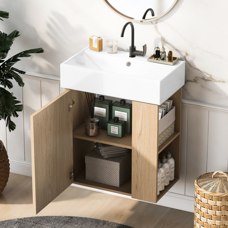 Meuble-lavabo mural moderne de 21,6 po avec poignée en or rose, fixation pour robinet à un trou, rangement latéral pour les petites salles de bain, porte ondulée, articles de toilette et design élégant