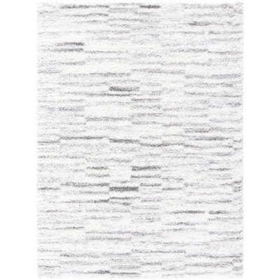 Tapis rectangulaire en polyester tissé à la machine à motif géométrique ivoire / gris Tifini