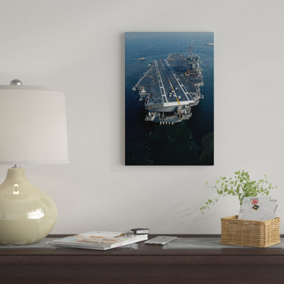 " The Conventionally Powered Aircraft Carrier USS Kitty Hawk " by Stocktrek Images