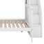 Lit simple superposé au dessus d'un escalier avec rangement-126973128