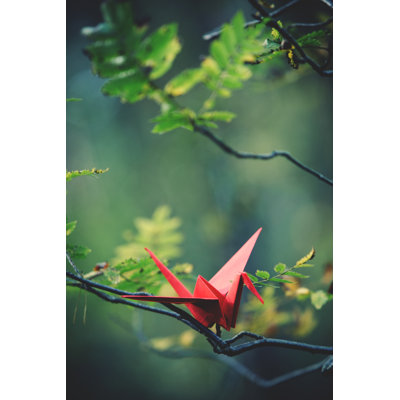Origami Crane On A Tree by Andrey Danilovich - Wrapped Canvas Print