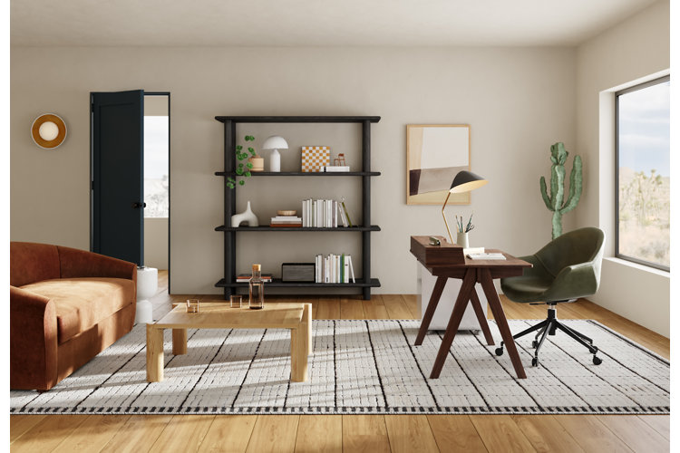 luxuryhome office with a modern wooden desk, green upholstered desk chair, black and white area rug, wood coffee table and orange modern sofa